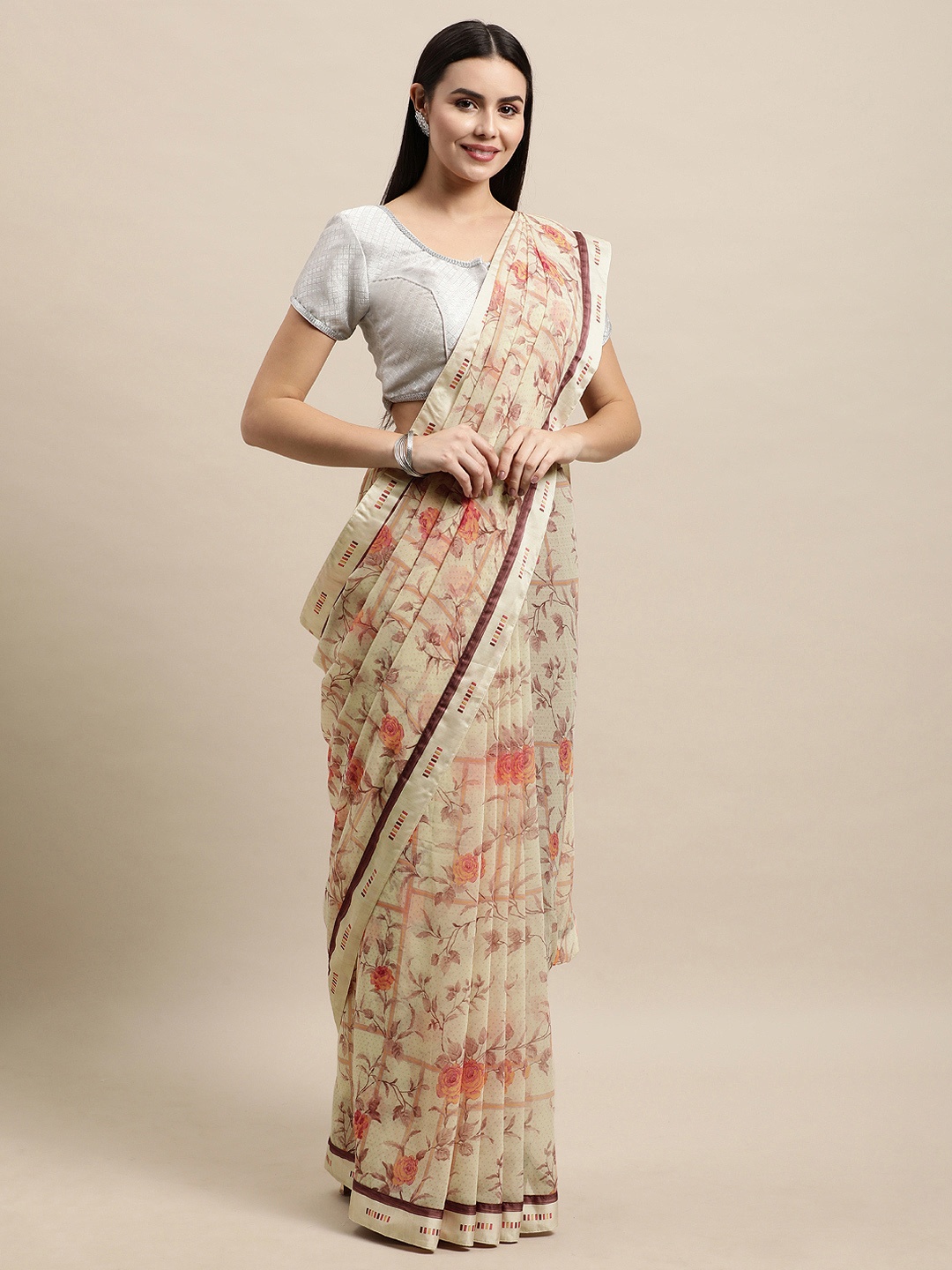 

Vishal Prints Mauve & Off White Ethnic Motifs Print Saree