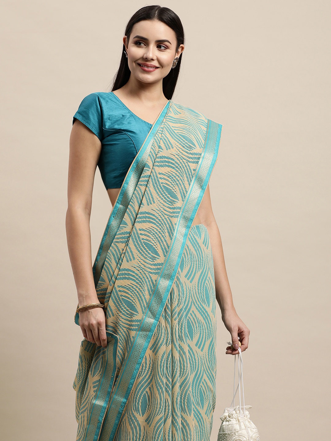 

Vishal Prints Blue & Beige Abstract Print Saree