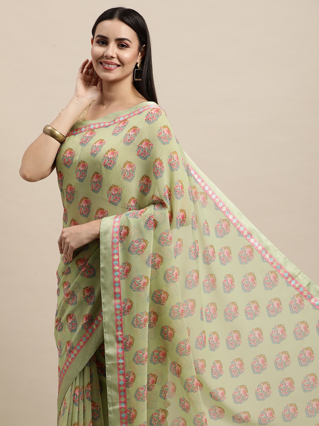 

Vishal Prints Green & Pink Ethnic Motifs Saree