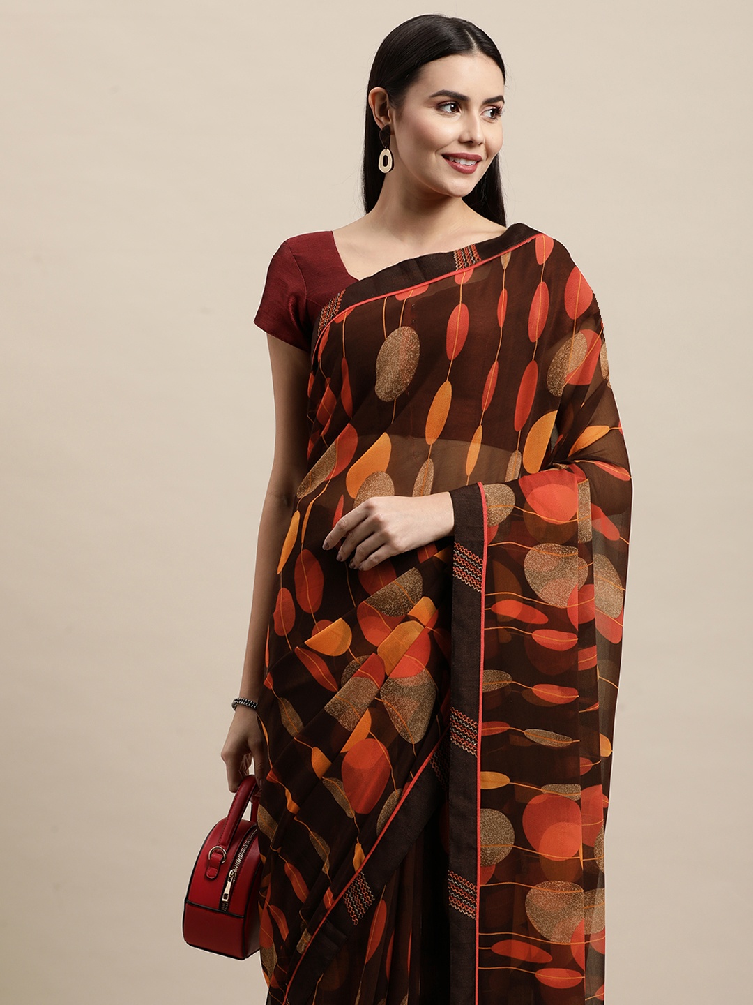 

Vishal Prints Coffee Brown & Red Abstract Print Saree