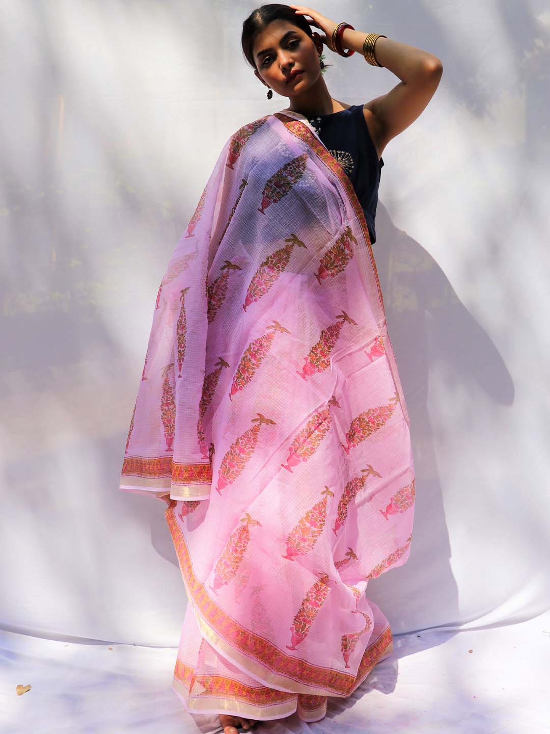 

Chidiyaa Women Pink & Orange Floral Pure Silk Saree
