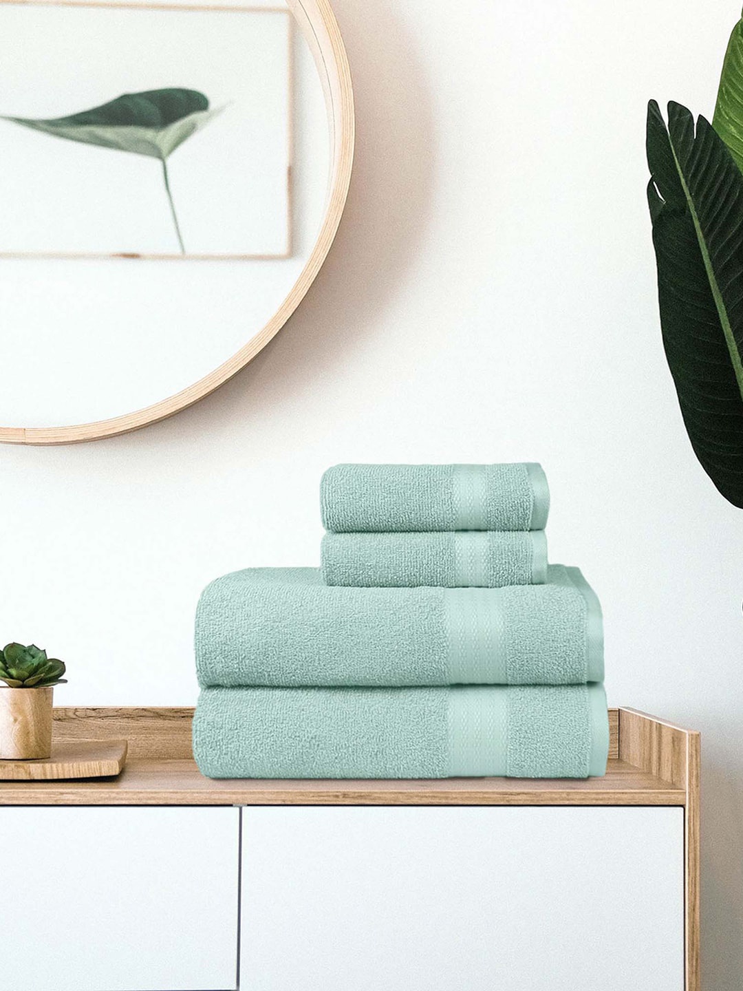 

Trident Set Of 4 Blue Solid 400 GSM Towel Set