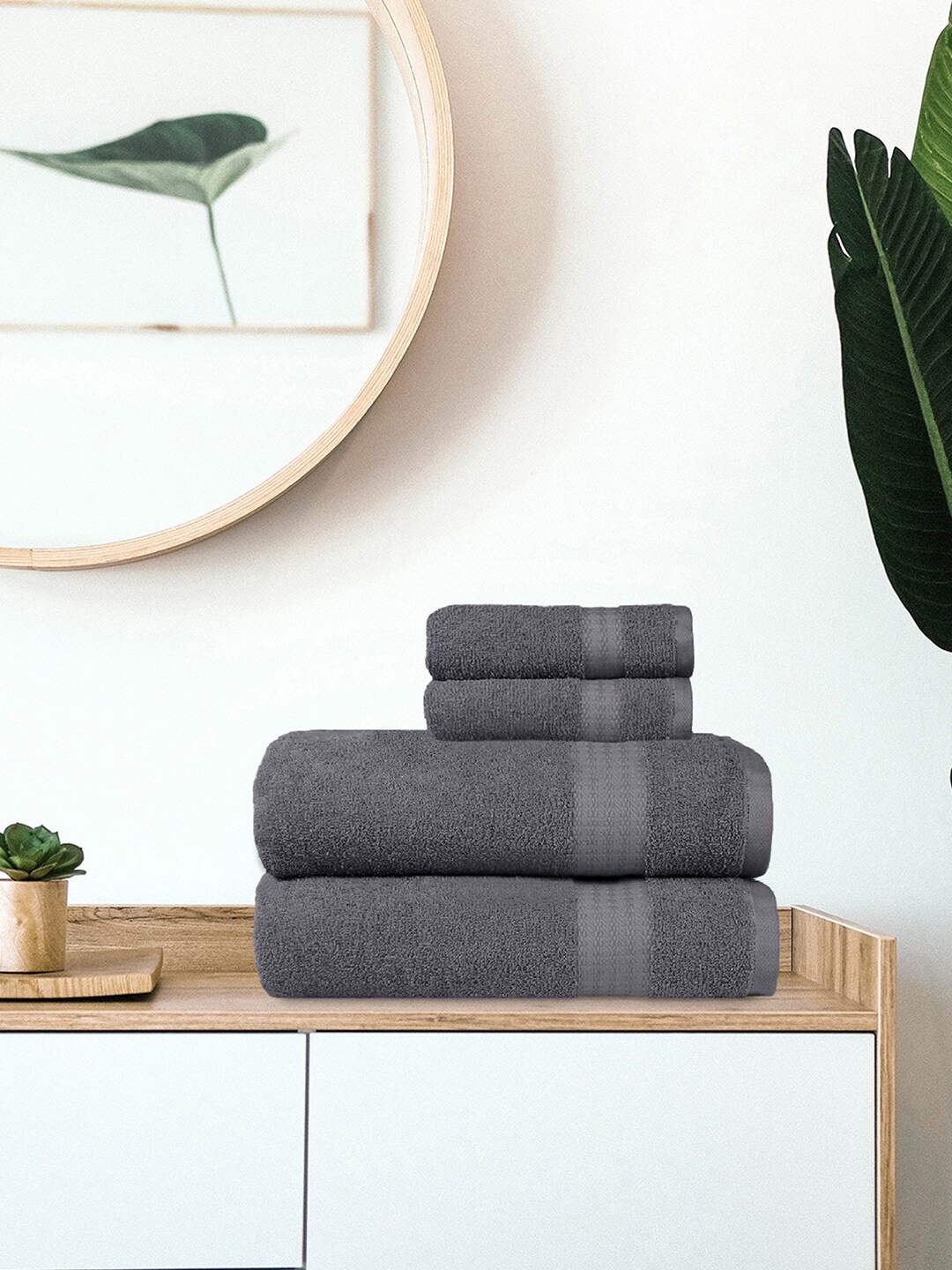 

Trident Set Of 4 Grey Solid 400 GSM Towel Set