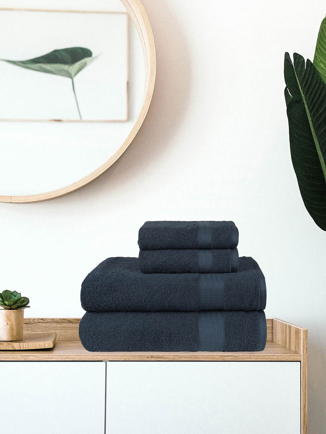 

Trident Set Of 4 Navy Blue Solid 400 GSM Towel Set