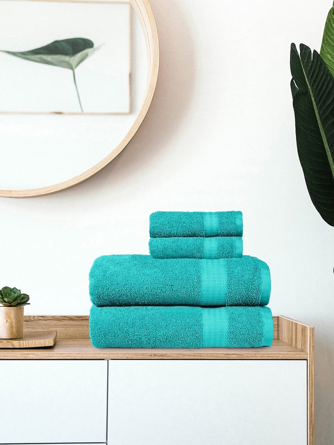 

Trident Set Of 4 Blue Solid 400 GSM Cotton Bath & Hand Towel Set