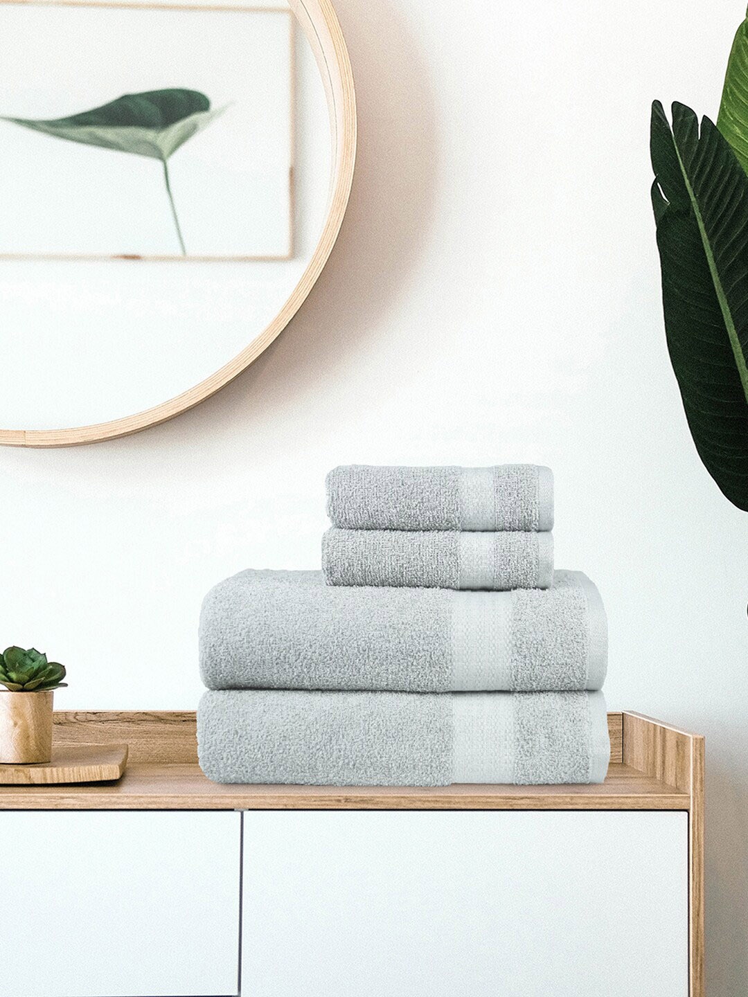 

Trident Set Of 4 Grey Solid 400 GSM Towel Set