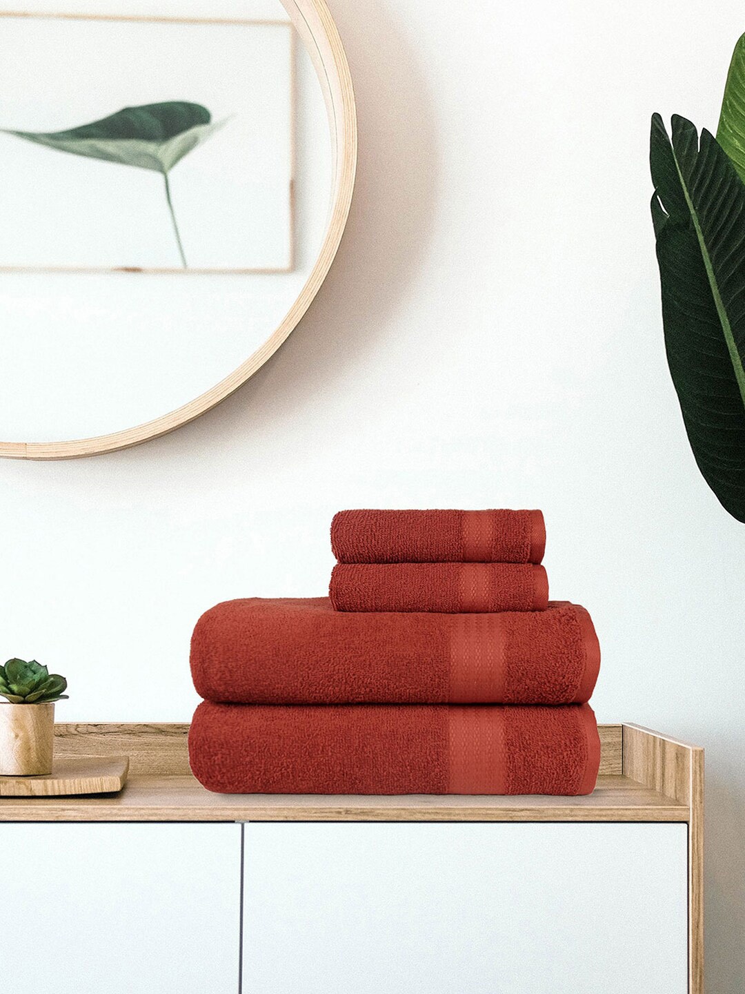 

Trident Set Of 4 Red Solid 400 GSM Towel Set