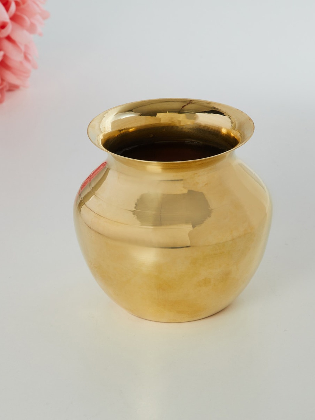 

Home Centre Gold-Toned Solid Metal Pooja Lota