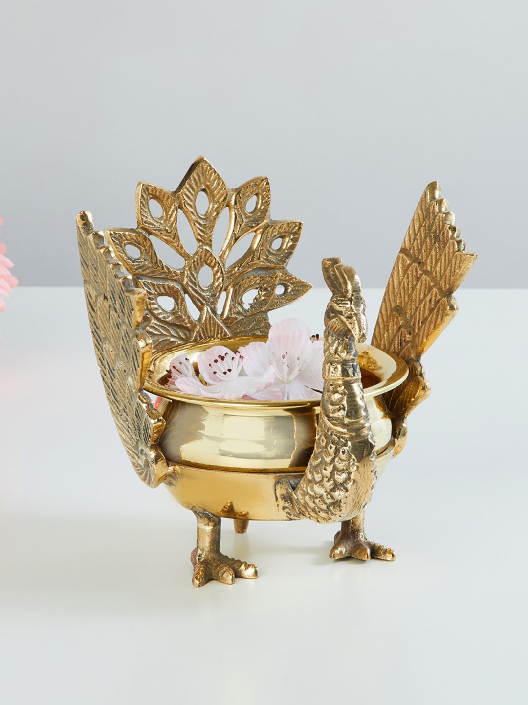 

Home Centre Gold Serenity Peacock Metal Pooja Bowl
