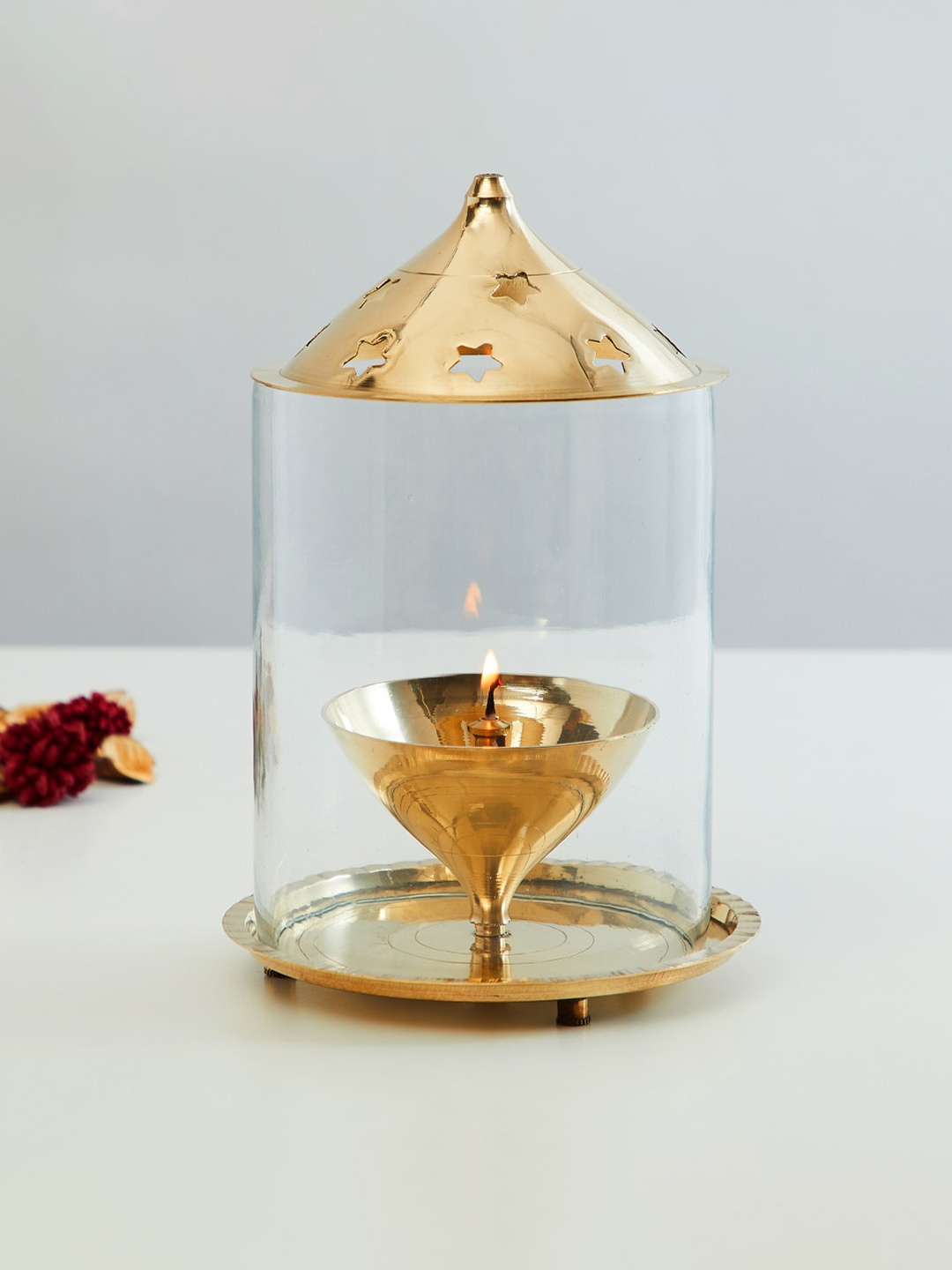 

Home Centre Gold-Toned Solid Metal Diya with Glass Lid