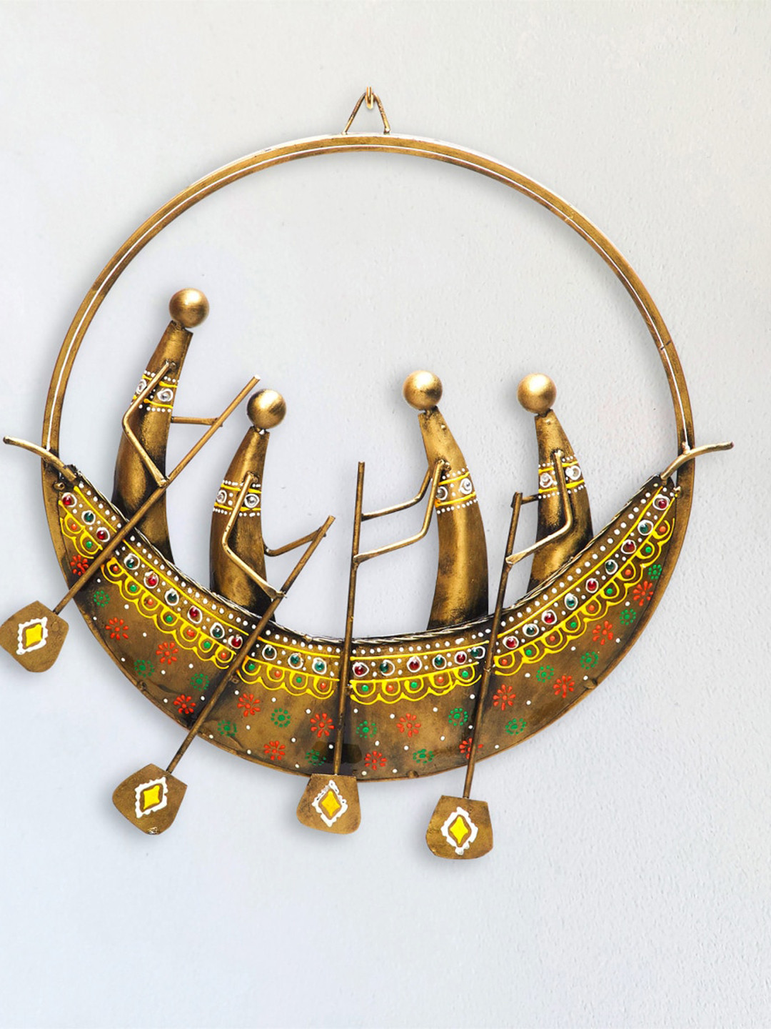 

Home Centre Gold-Toned Boat Men Iron Wall Decor