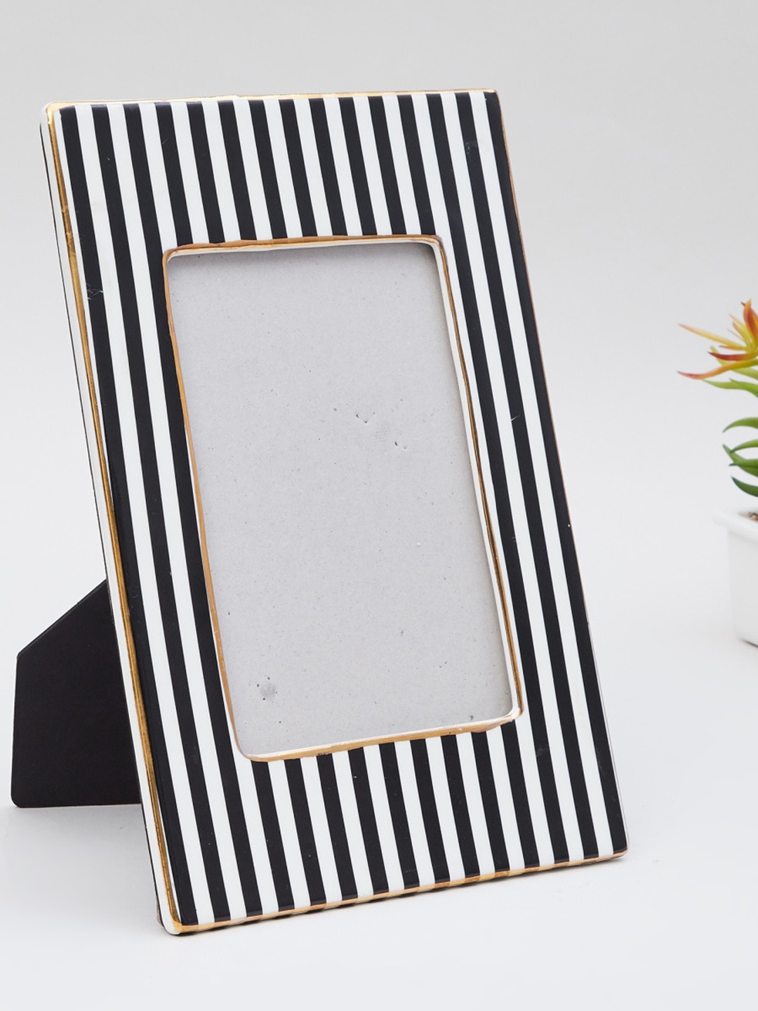 

Home Centre Black & White Striped Ceramic Picture Frame