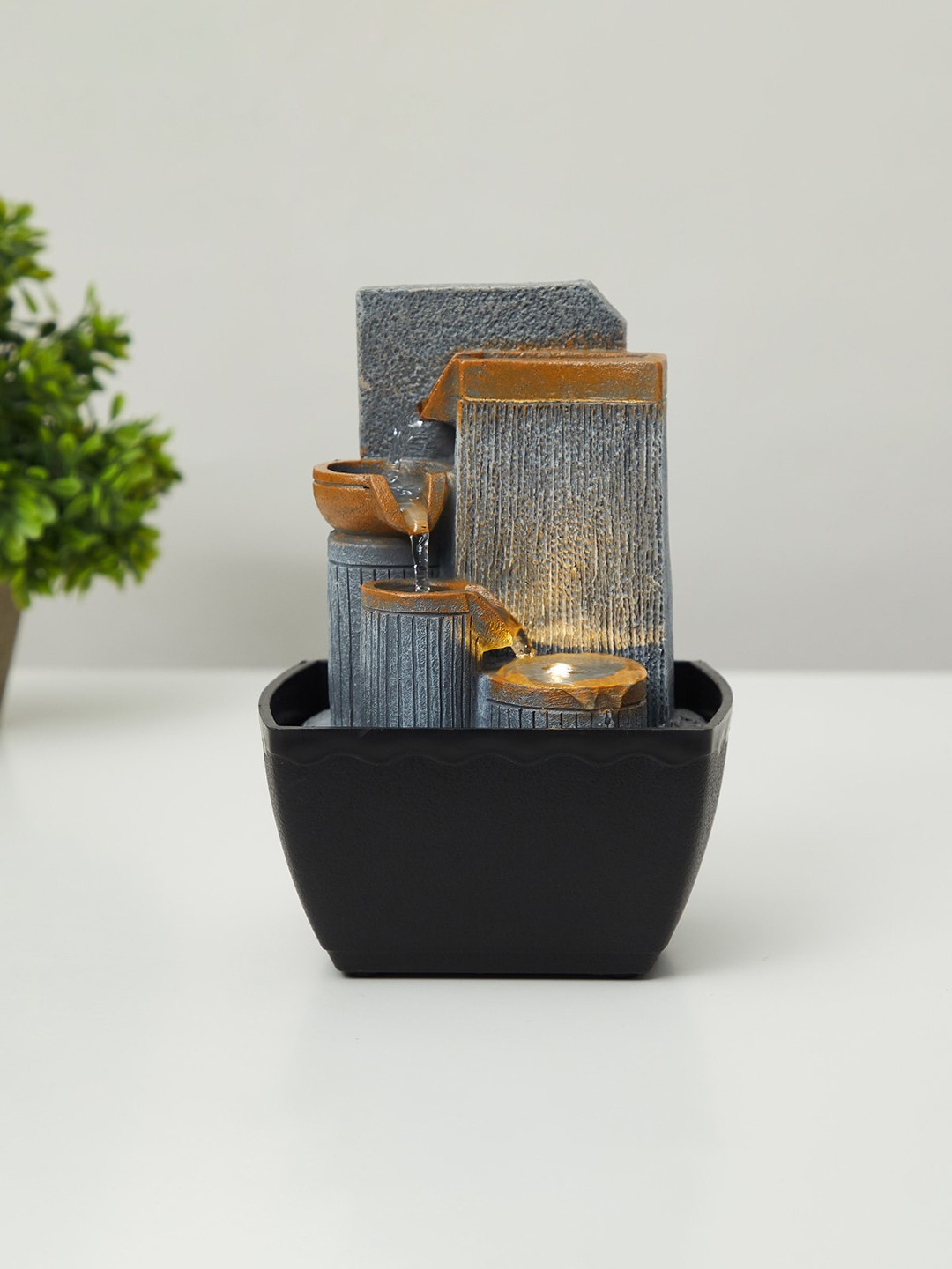 

Home Centre Grey Diya Water Fountain Showpieces