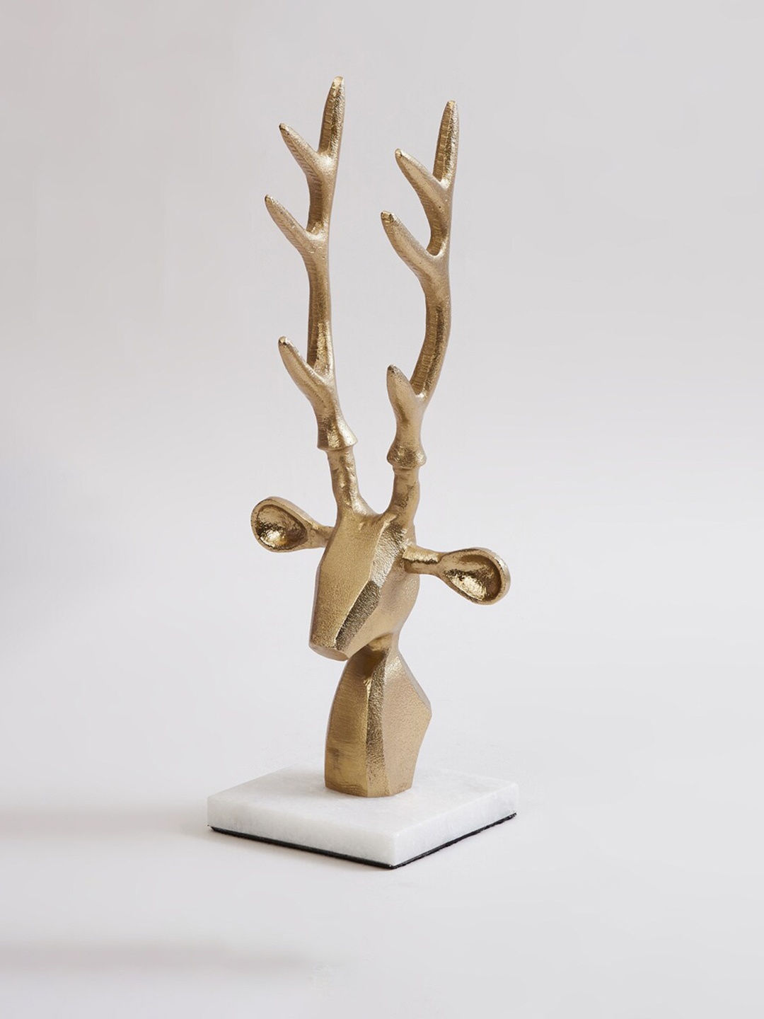 

Home Centre Gold Toned Solid Reindeer Figurine
