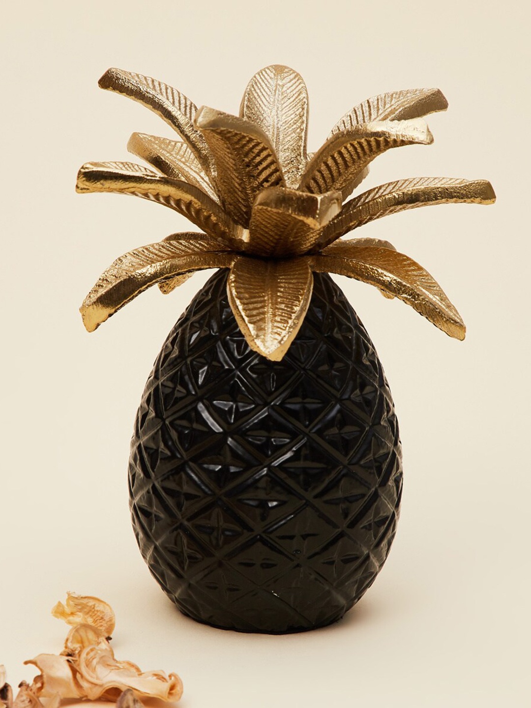 

Home Centre Black & Gold-Toned Textured Metal Pineapple Figurine Showpieces
