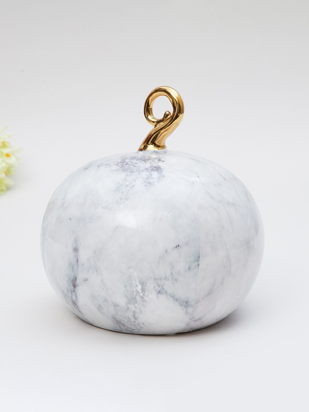 

Home Centre White Printed Pumpkin Ceramic Showpiece