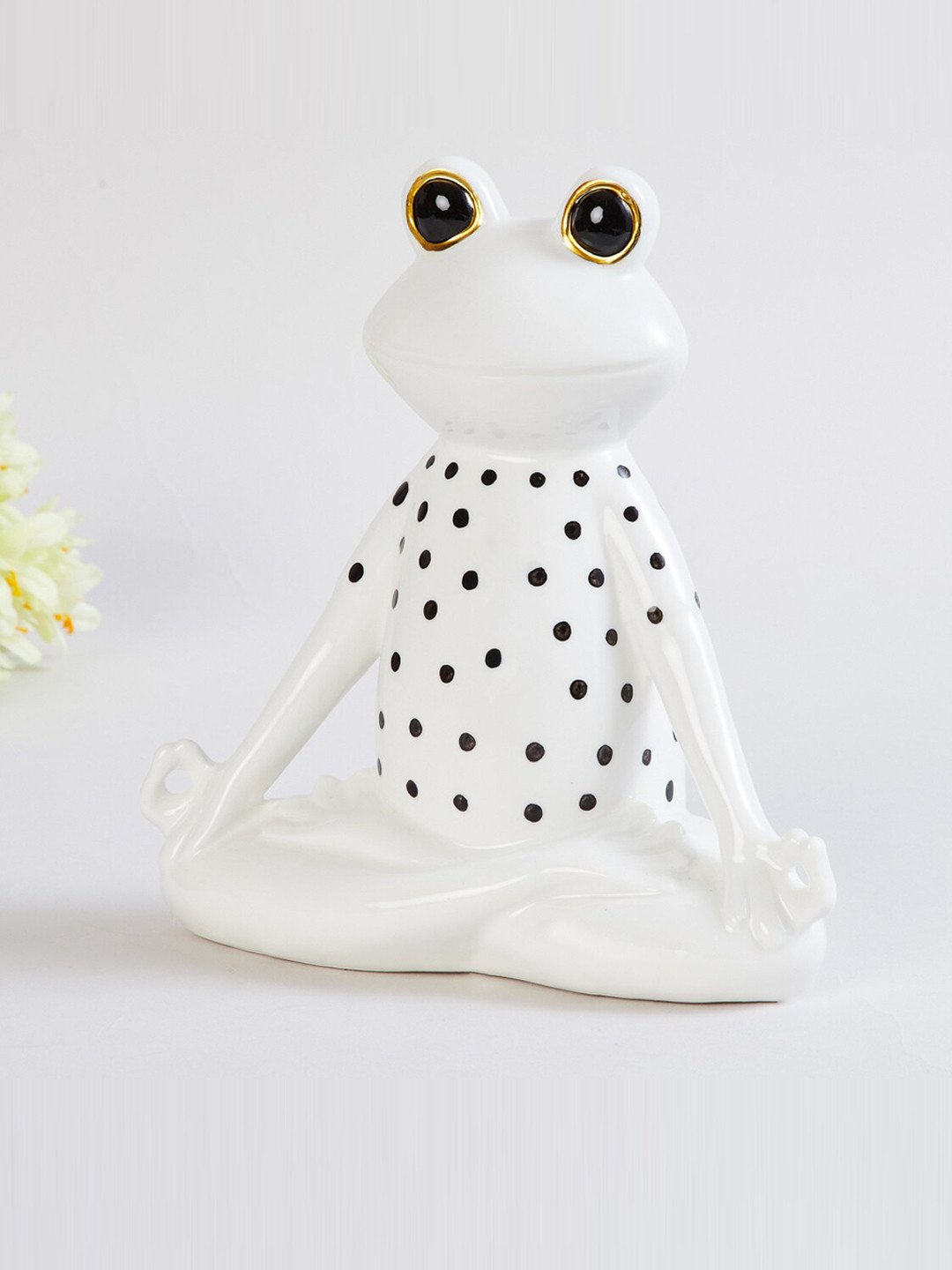 

Home Centre White & Black Printed Frog Ceramic Showpiece