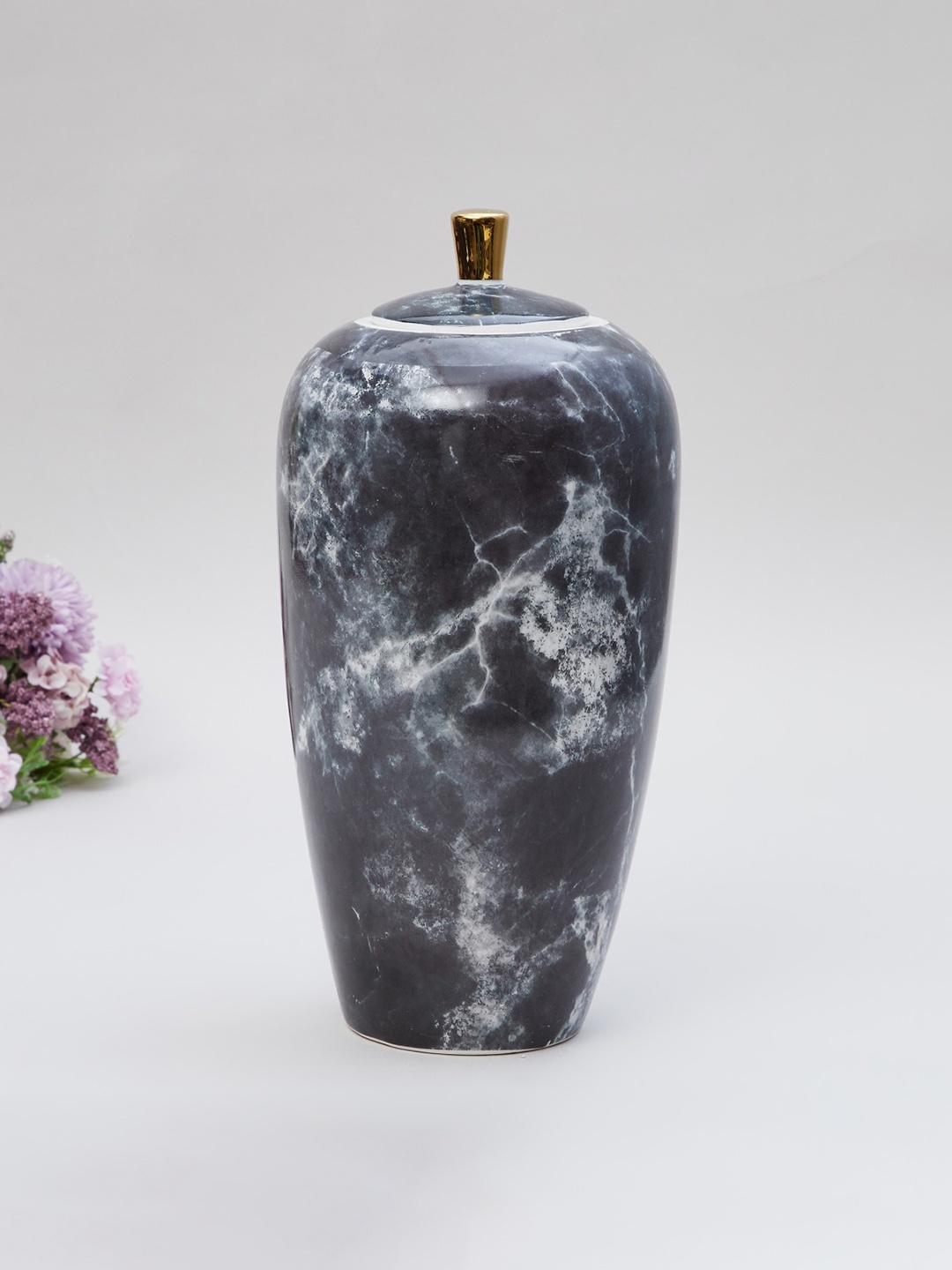 

Home Centre Eternity Black Patterned Avocado-Shaped Ceramic Decorative Jar with Lid