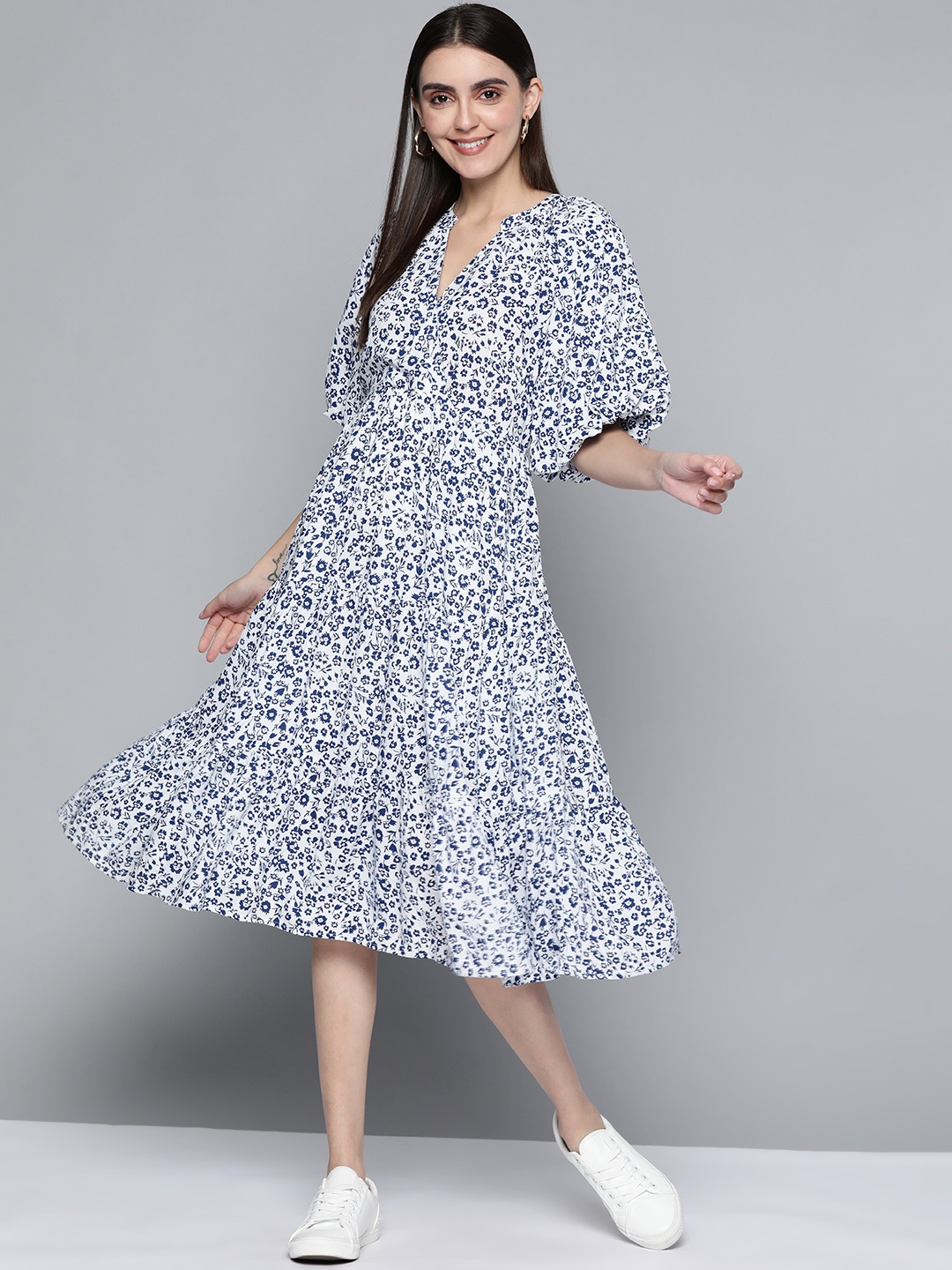 

Femella Women White & Navy Blue Floral Printed A-Line Midi Dress