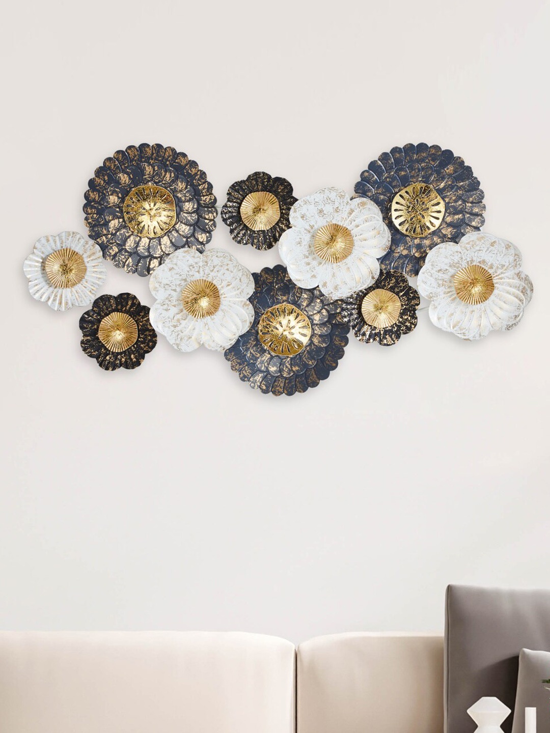 

Home Centre Fiesta Gold toned & White Textured Wall Decor