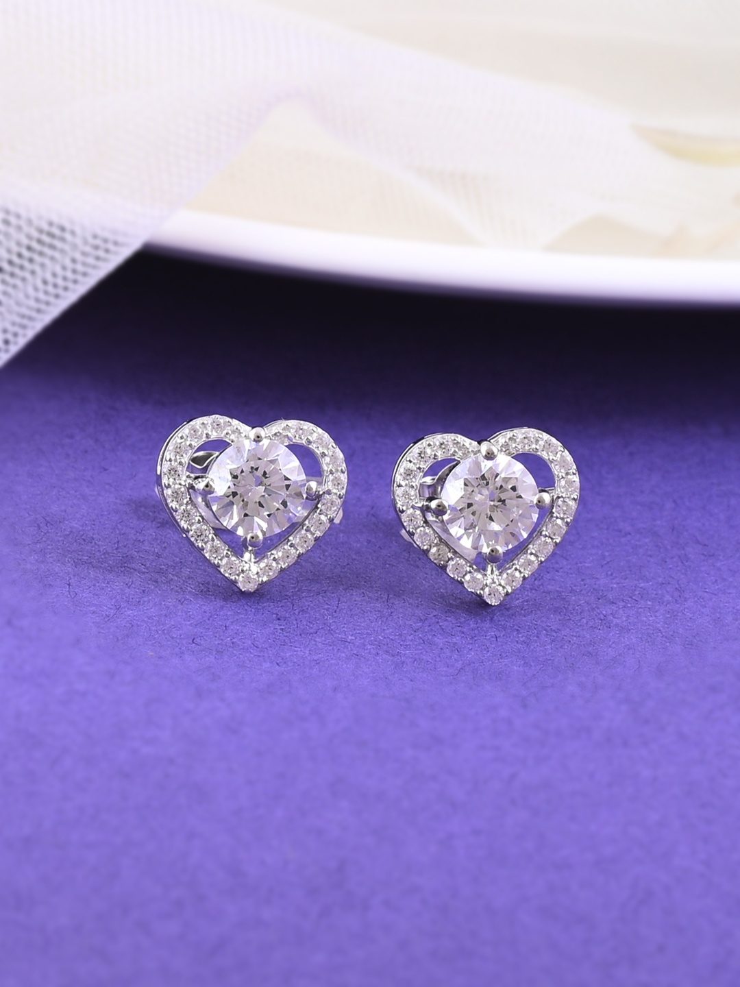 

Studio Voylla Silver-Toned Heart Shaped Studs Earrings