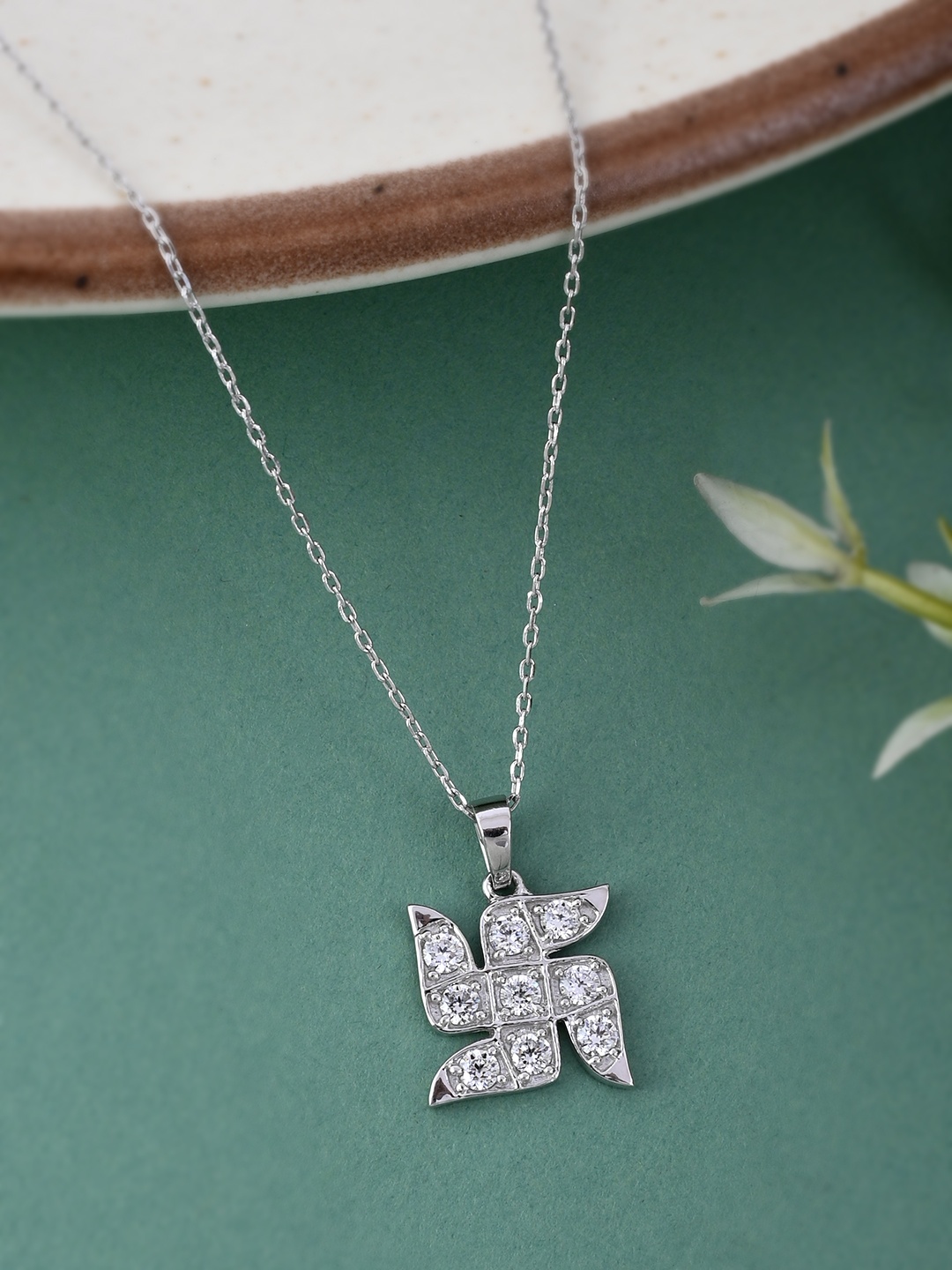 

Studio Voylla 925 Sterling Silver American Diamond CZ Exquisite Swastik Pendant