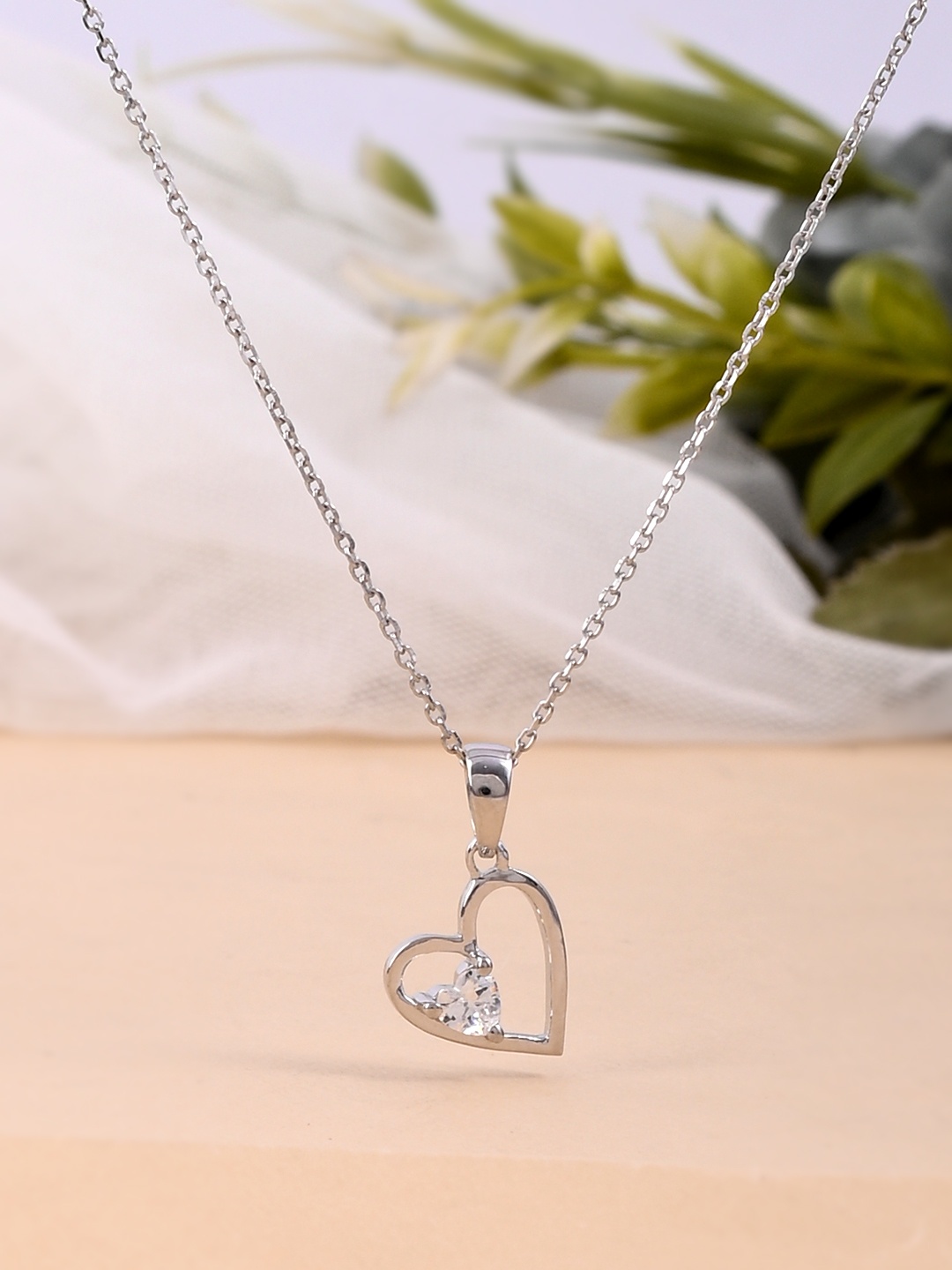 

Studio Voylla 925 Sterling Silver American Diamond CZ Heart Carved Pendant