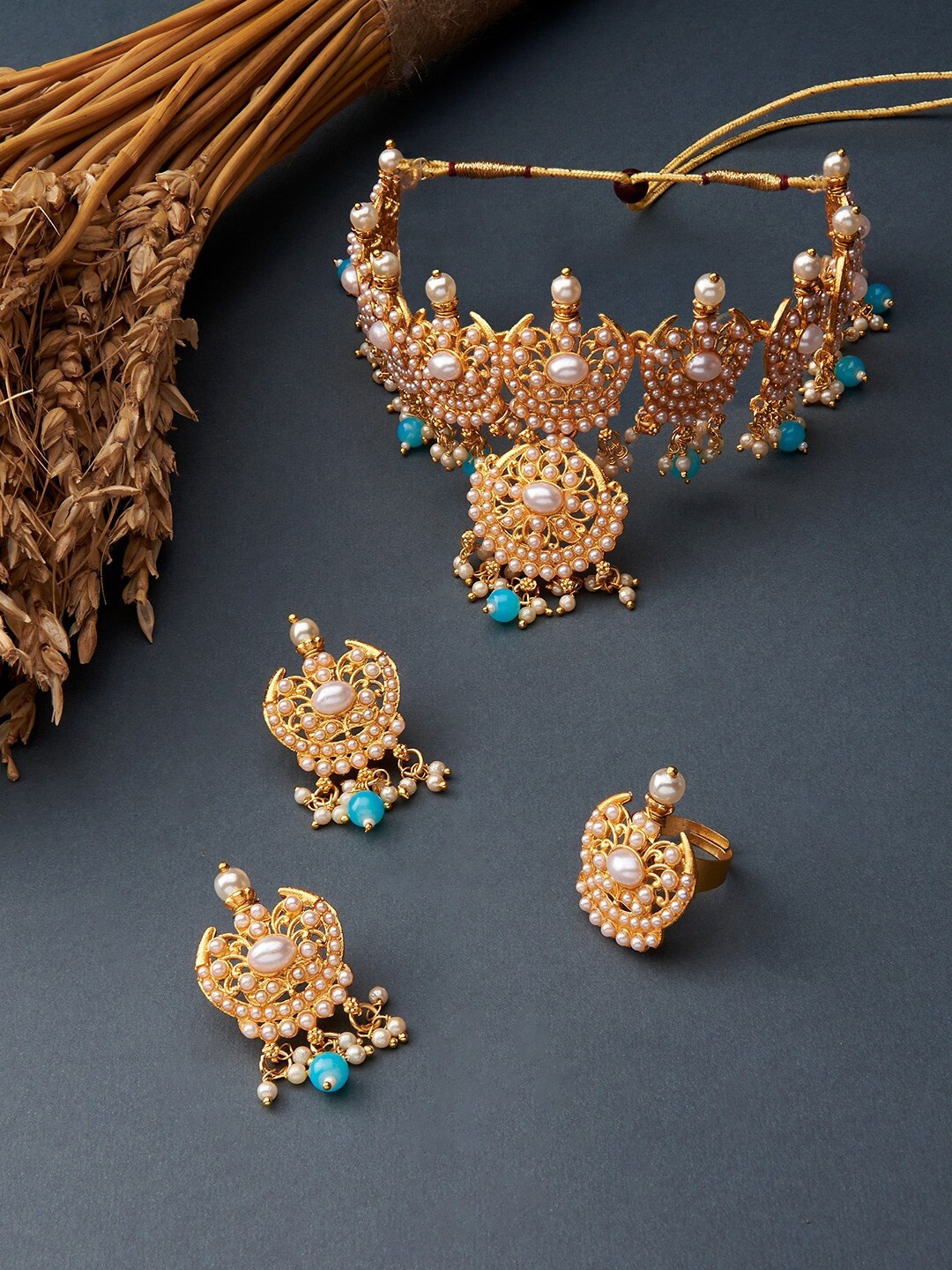 

Zaveri Pearls Gold-Plated Blue Stone-Studded & Pearl Beaded Jewellery Set