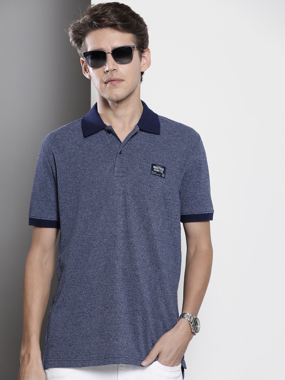

Nautica Men Blue Self Design Polo Collar Casual T-shirt