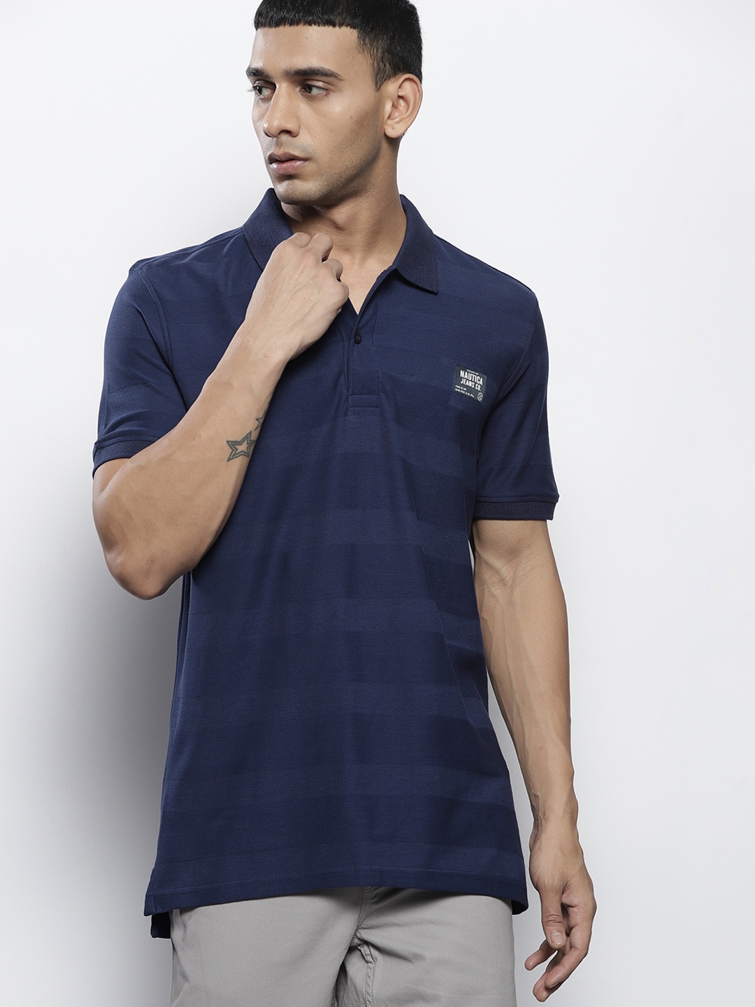 

Nautica Men Navy Blue Solid Polo Collar Pure Cotton T-shirt
