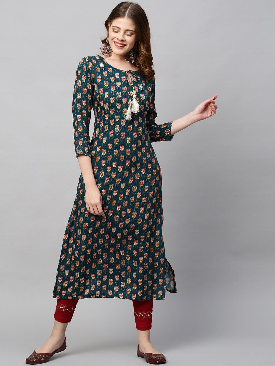 

FASHOR Women Teal Ethnic Motifs Printed Flared Sleeves Kurta
