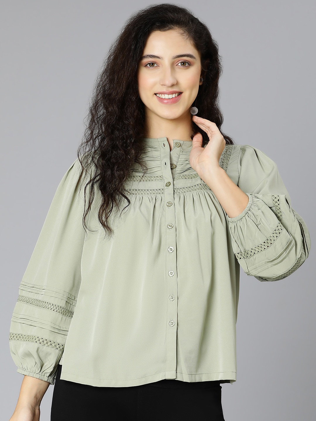 

Oxolloxo Women Green Solid Laced Up Regular Top