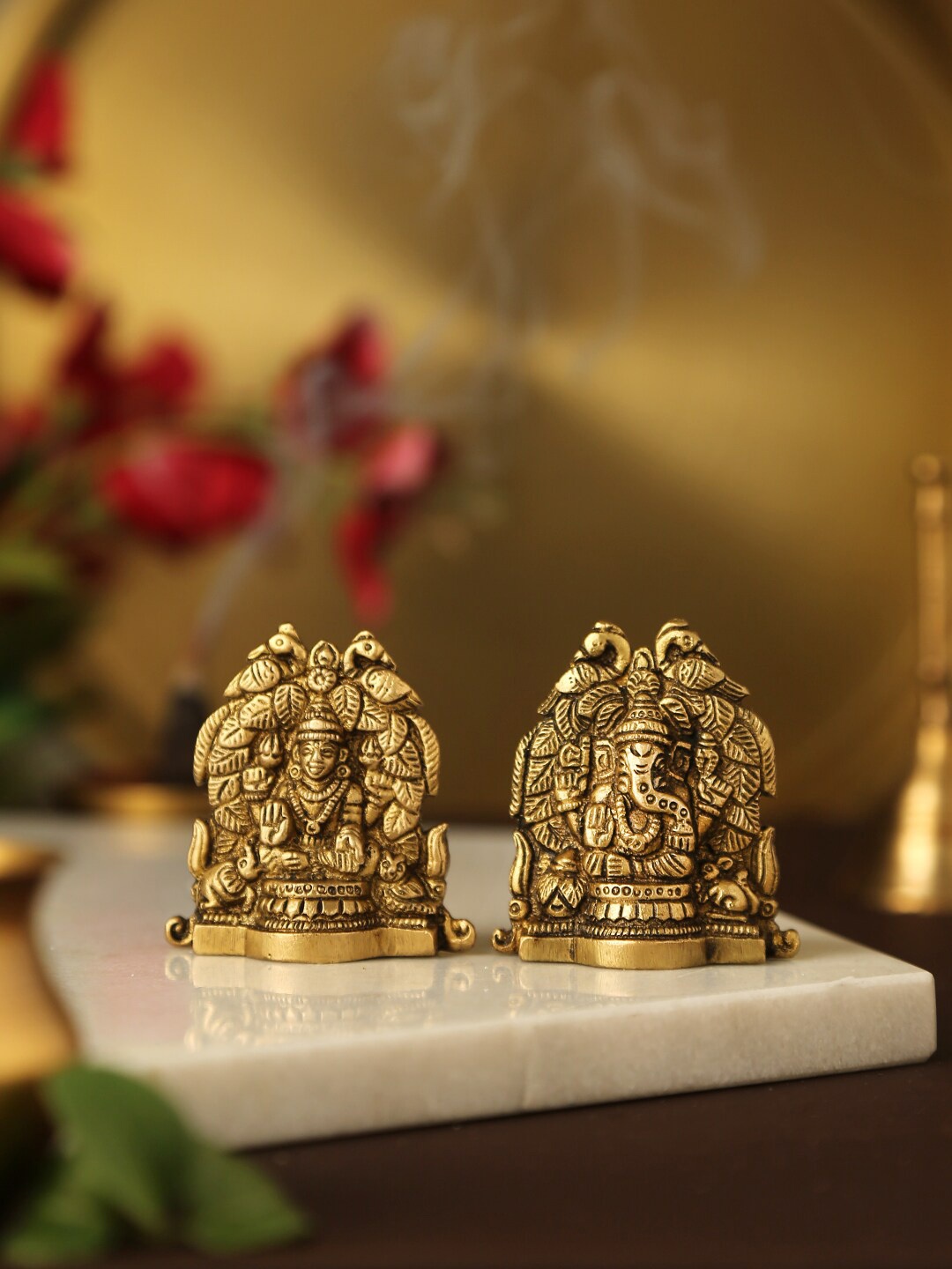 

Amoliconcepts Set Of 2 Laxmi Ganesha with Peacock details Showpieces, Gold