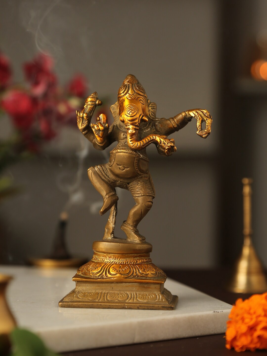 

Amoliconcepts Gold toned Brass Dancing Ganesh Showpieces