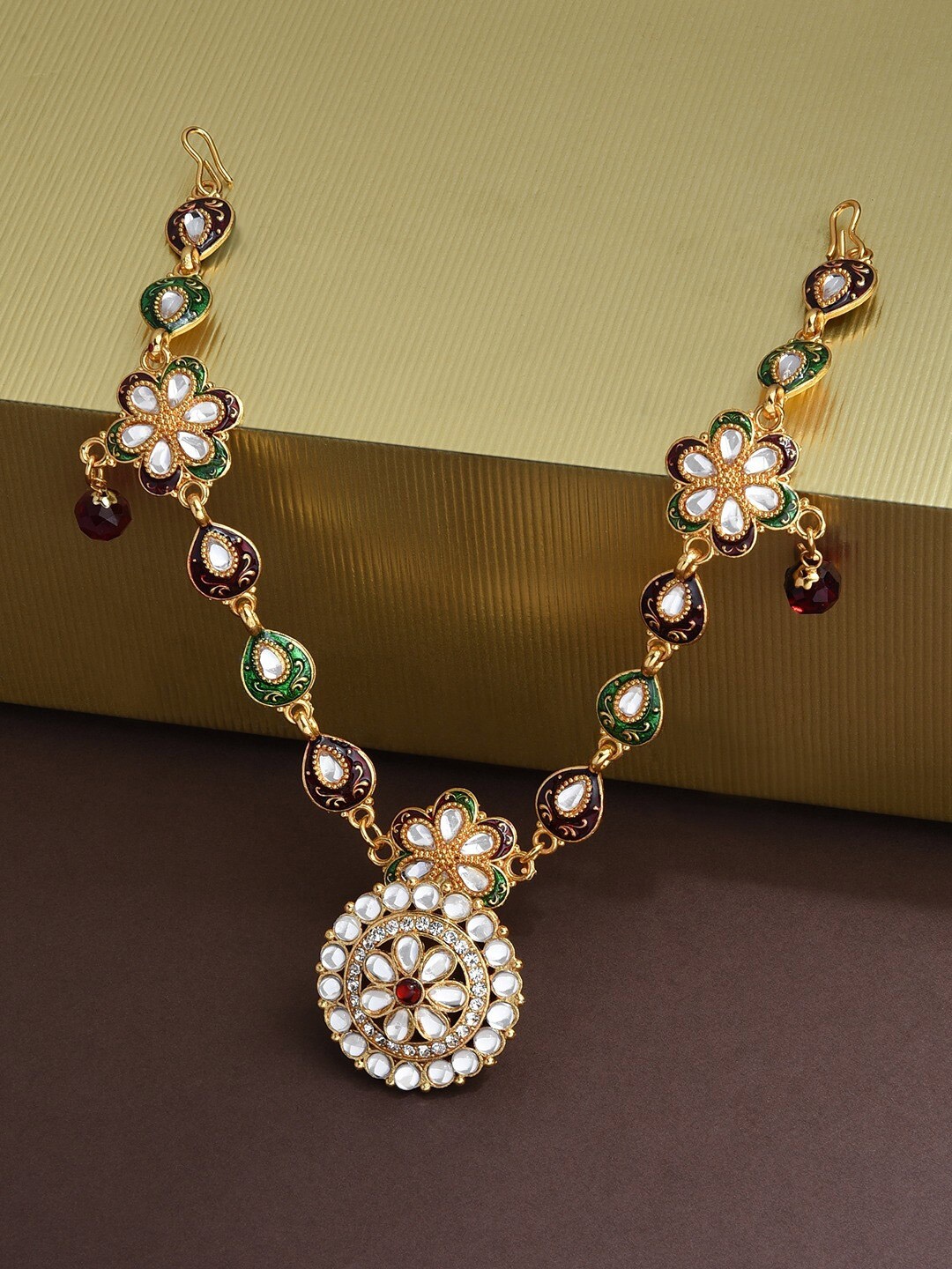 

Zaveri Pearls Women Red & Gold-Toned Embellished Head Chains