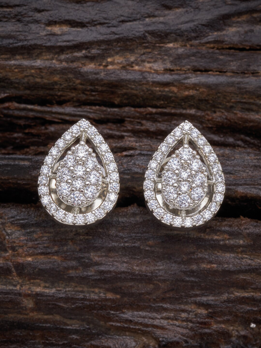 

Kushal's Fashion Jewellery Women White Teardrop Shaped Studs Earrings