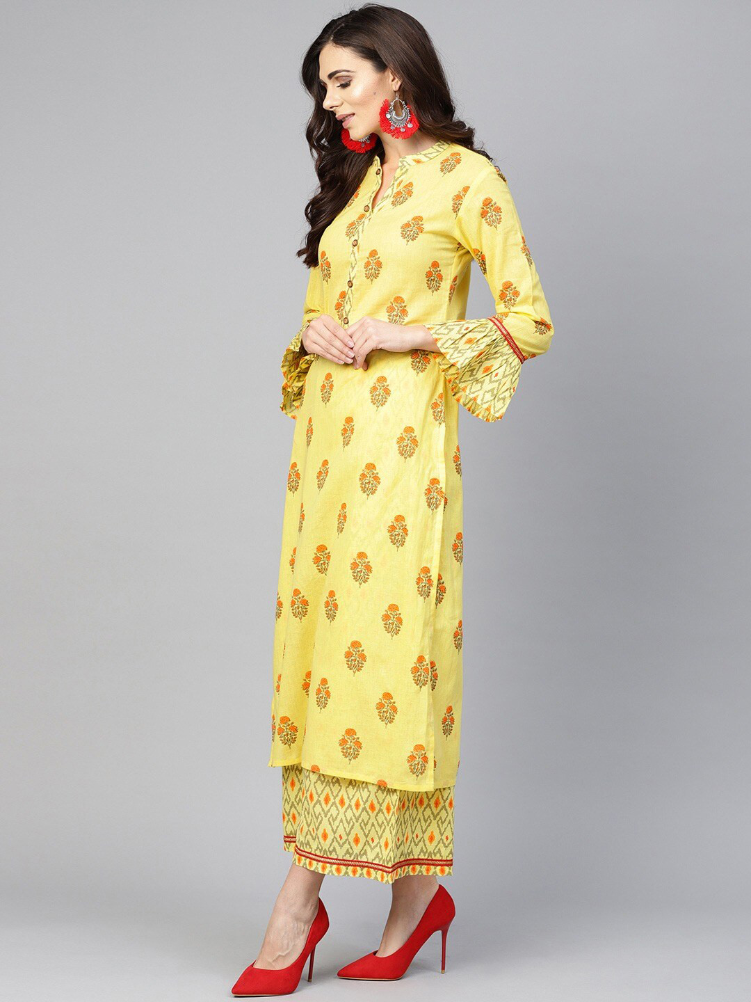 

Tulsattva Women Yellow Ethnic Motifs Printed Pure Cotton Kurta with Palazzos
