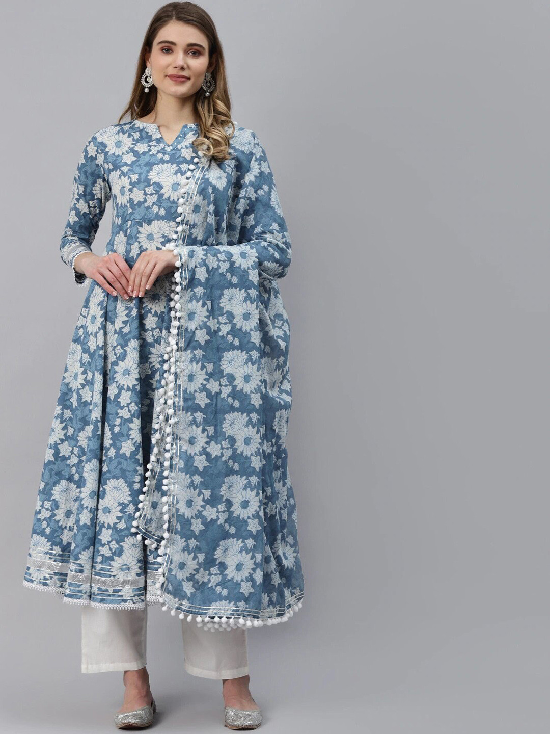 

Divena Women Blue & White Floral Printed Cotton Kurta with Trousers & With Dupatta