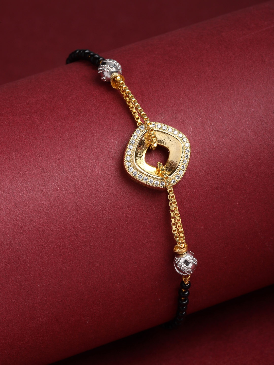 

PANASH Gold-Plated Black Beaded White CZ Stone Studded & Beaded Hand Mangalsutra