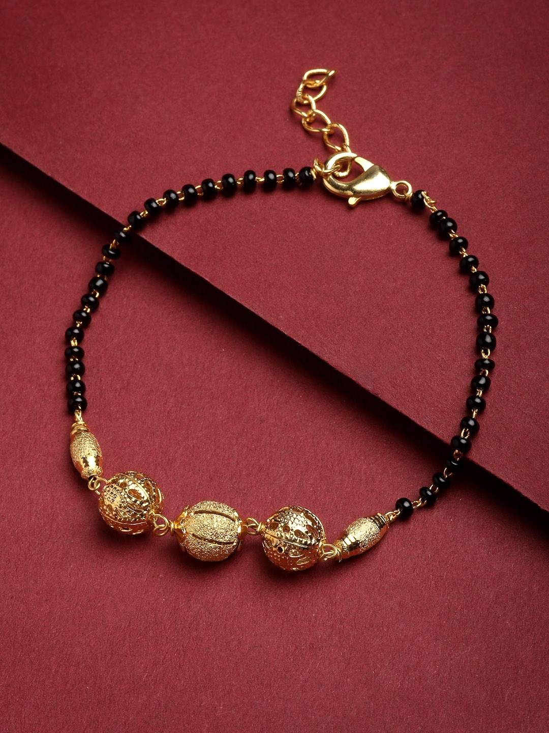 

PANASH Gold-Plated & Black Beaded Hand Mangalsutra