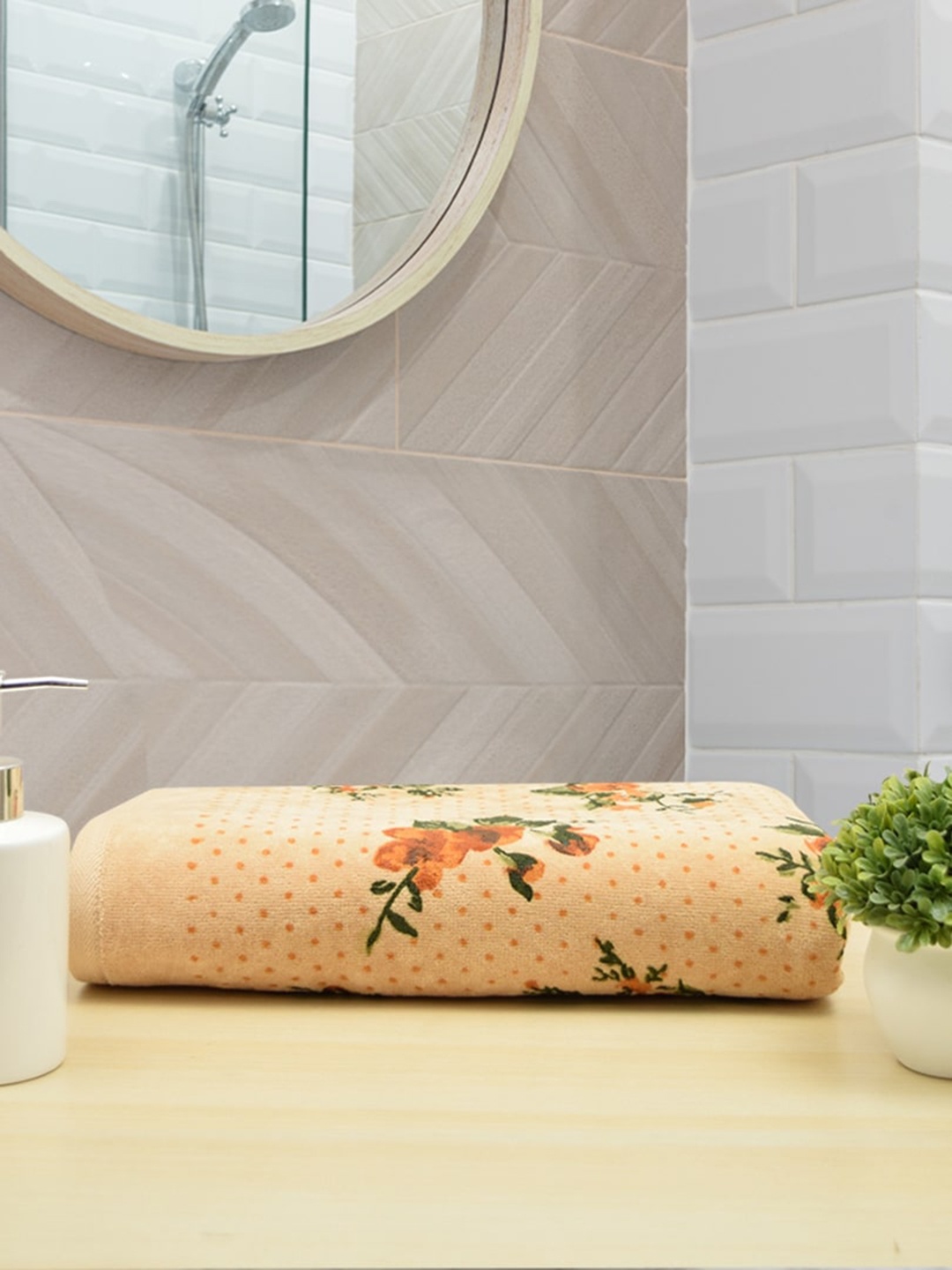 

RANGOLI Beige & Orange Printed 450 GSM Pure Cotton Bath Towel