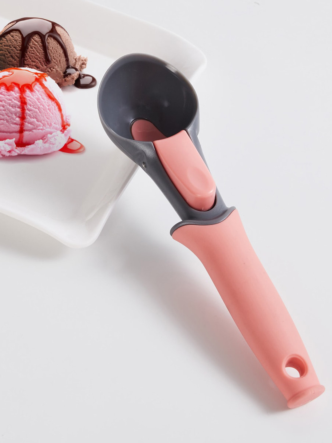 

Home Centre Pink & Grey Solid Ice Cream Scoop Ladle