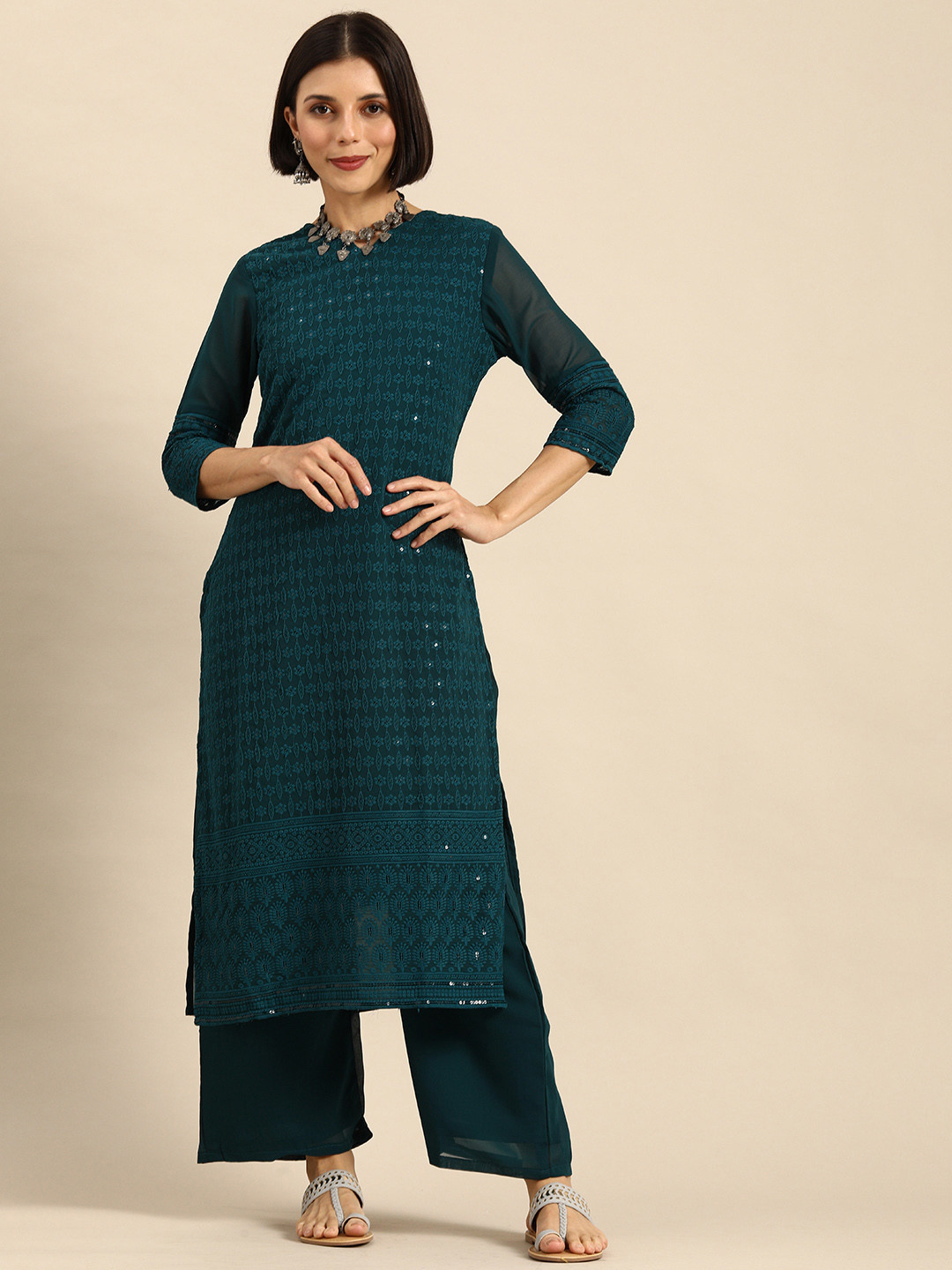 

Anouk Women Teal Blue Embroidered Sequinned Kurta with Palazzos