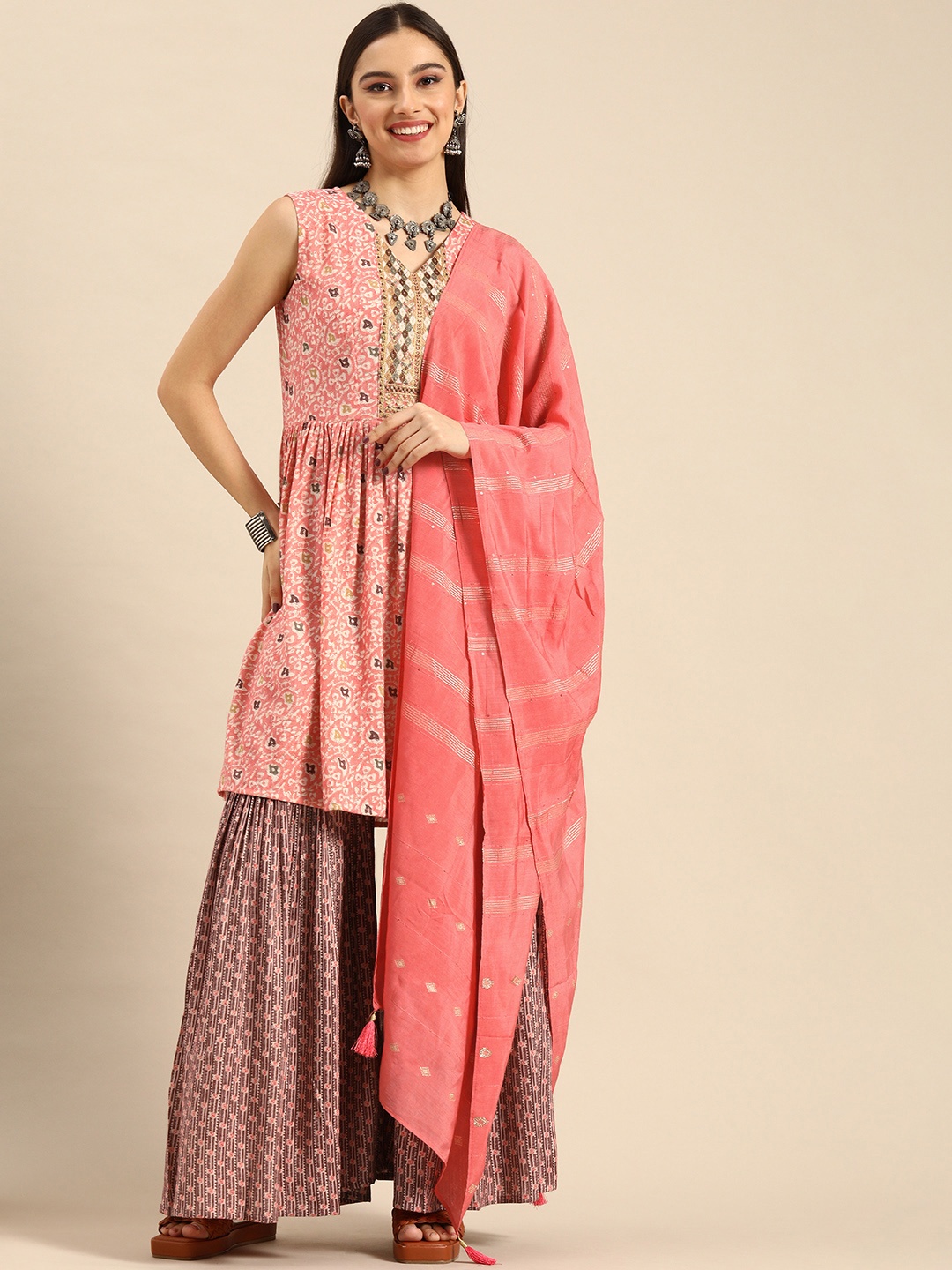

Anouk Women Peach-Coloured Embroidered Pleated Kurta with Sharara & Sequined Dupatta
