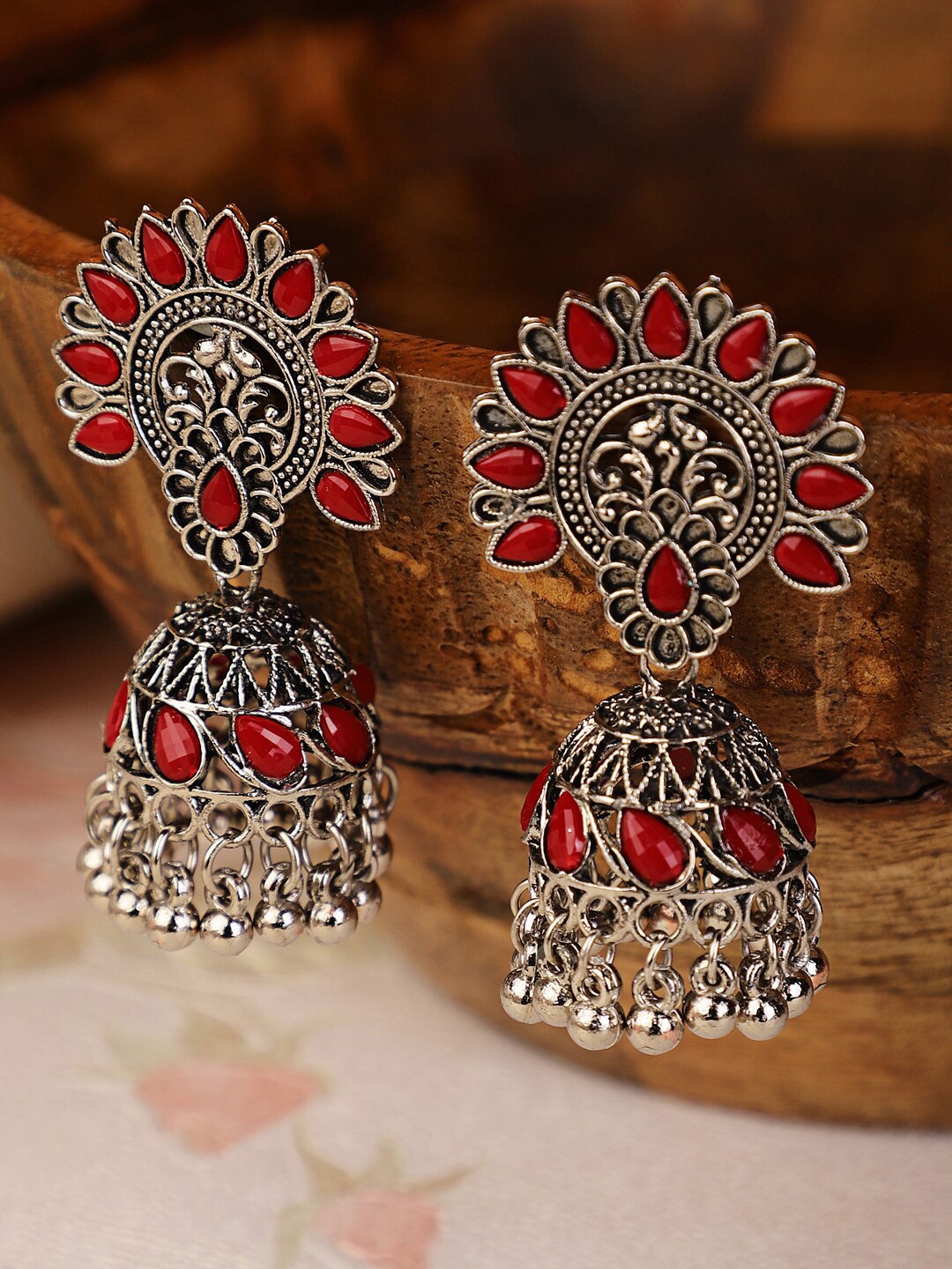 

Shining Diva Silver-Toned & Red Oxidised Dome Shaped Jhumkas Earrings