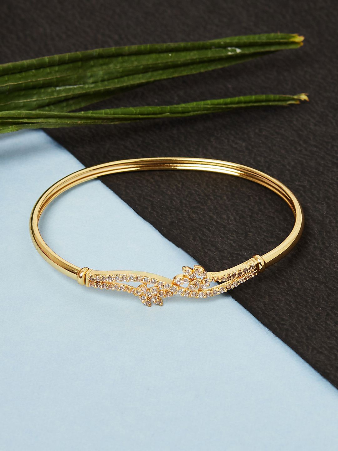 

Voylla Women Gold-Toned & White Brass Cubic Zirconia Gold-Plated Cuff Bracelet