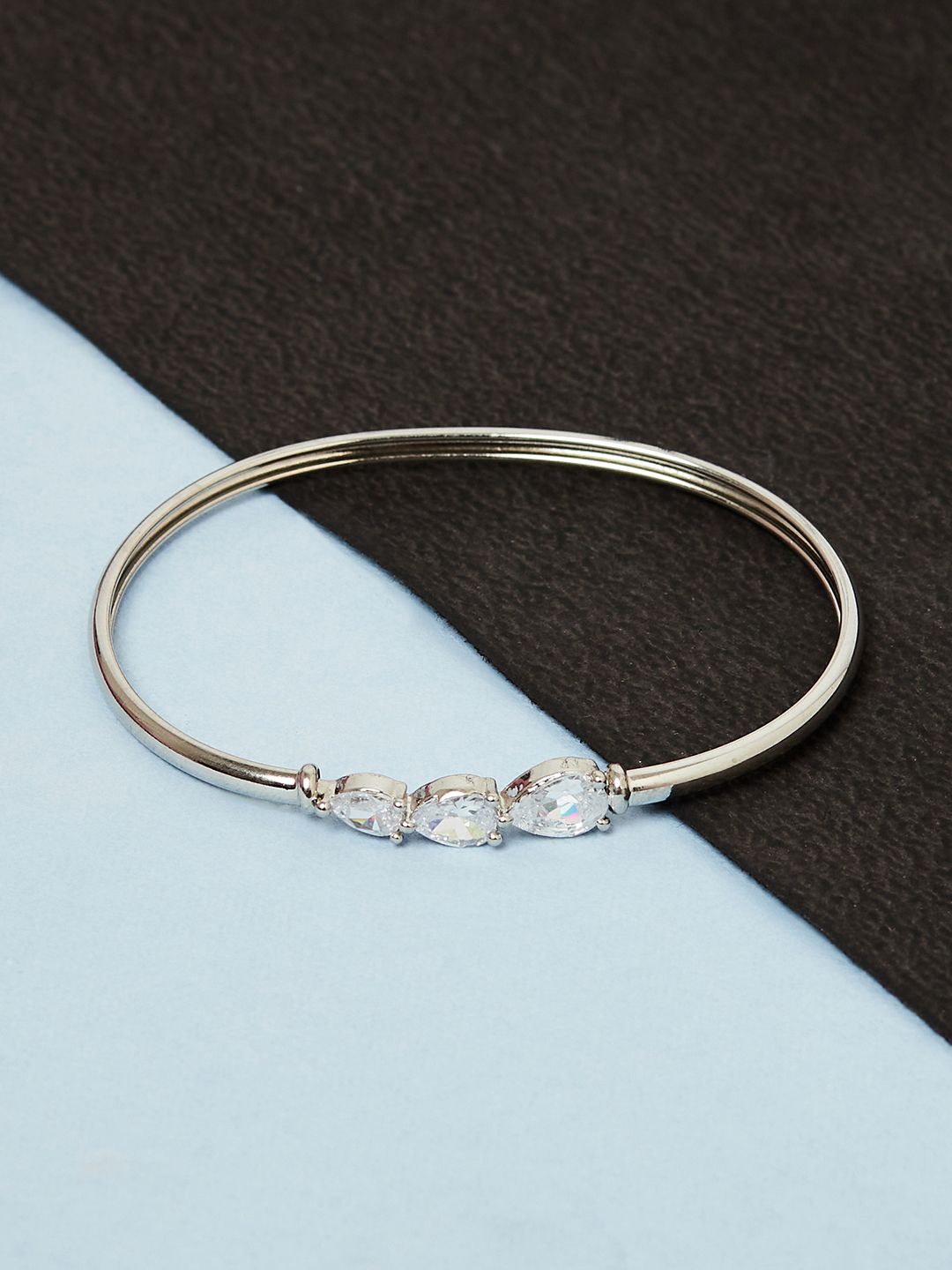 

Voylla Women Silver White Rhodium-Plated Brass Cuff Bracelet