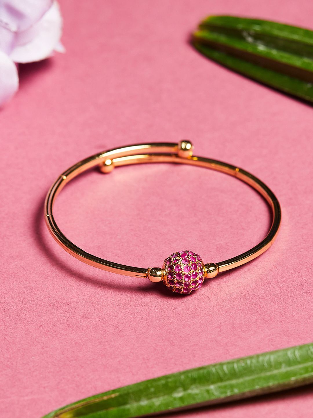 

Voylla Women Gold-Toned & Pink Brass Cubic Zirconia Gold-Plated Cuff Bracelet