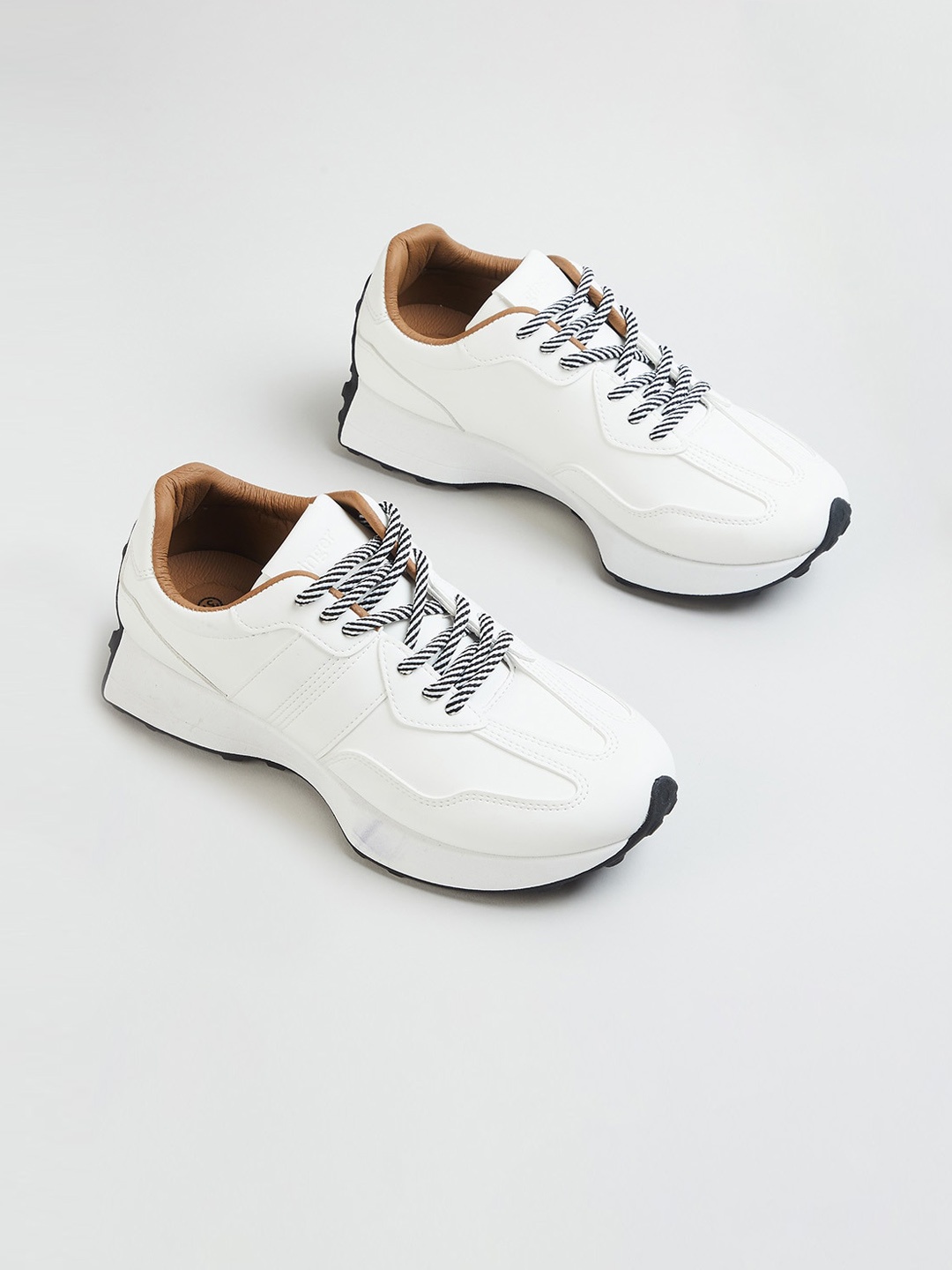 

Ginger by Lifestyle Women White Perforations Synthetic Sneakers