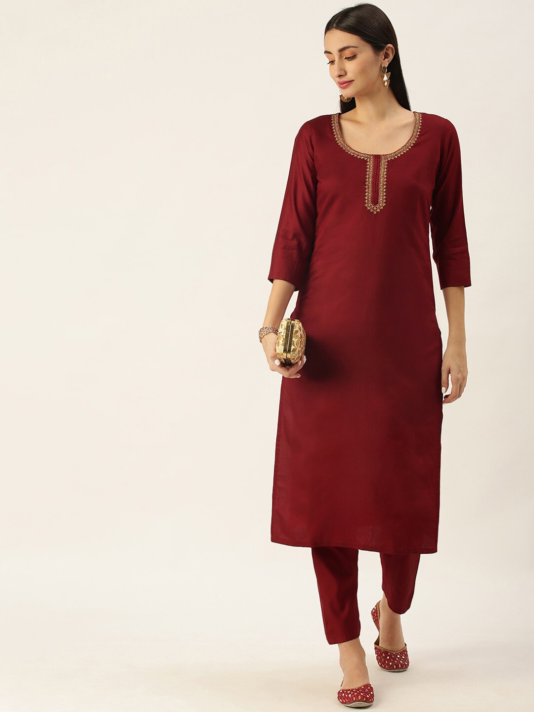 

Somras Women Maroon Yoke Design Thread Work Liva Kurta with Trousers